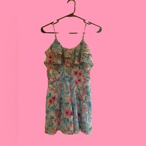 I am selling a cute flowery romper.